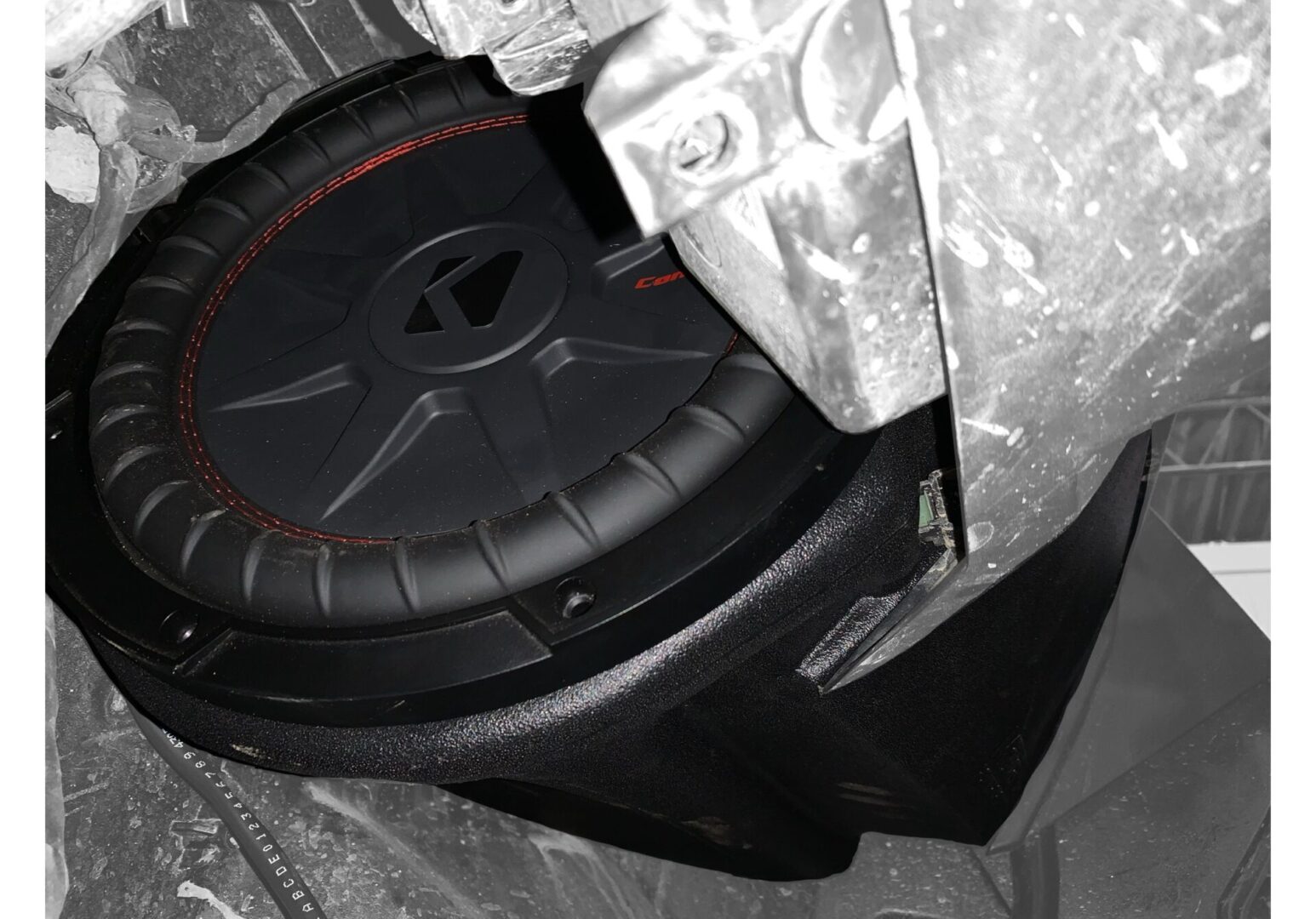 Image of a kicker 8 inch subwoofer