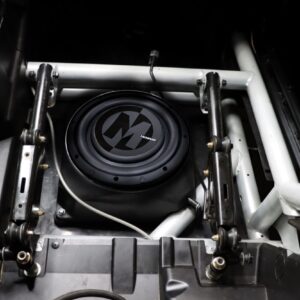 Close-up of a mechanical component with a circular part and metal rods.